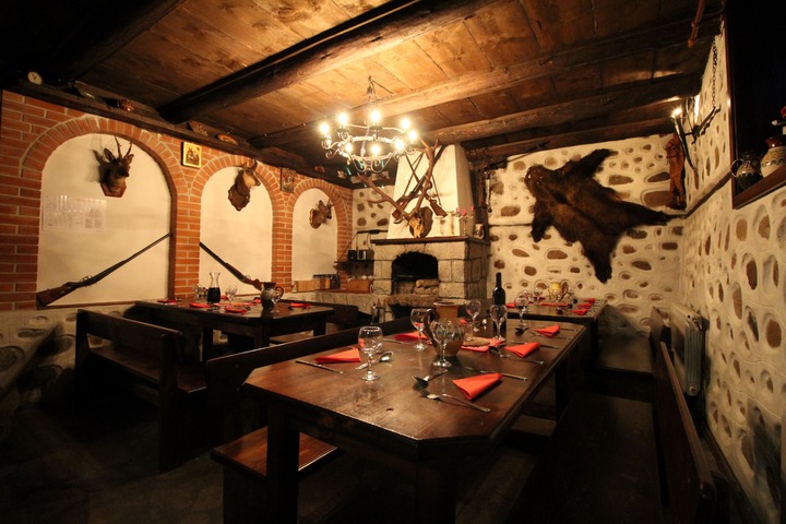 Bulgarian style dining room with log fire 