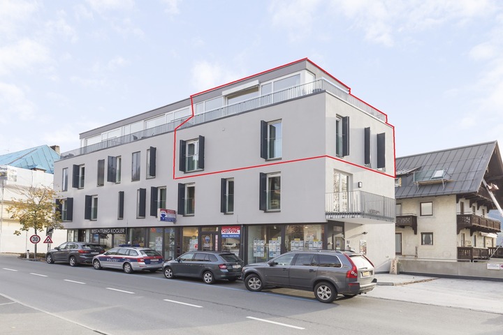 Front of building - 2 storey penthouse outlined in red